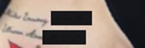 Close-up of a two-line cursive script tattoo on Nancy Mace's left ribcage naming her son and daughter, each followed by a date of birth that Maceopedia has redacted with black bars.